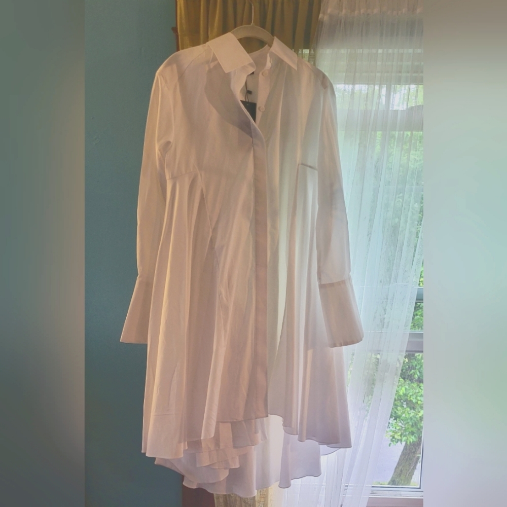 Oversized white shirt with French cuffs